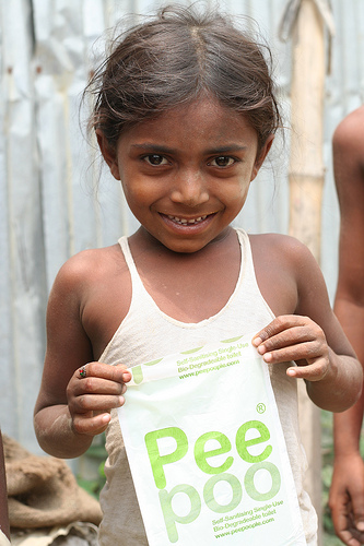 Girl with Peepoo: Creative Commons. All Rights Reserved. Photo by ecosan