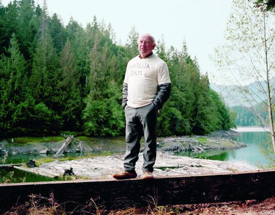 Yvon Chouinard at the Elwha Dam removal ceremony in 2011. Yvon is representing his own hometown action with his T-shirt calling for the removal of the Matilija Dam in Ventura County. Olympic Peninsula, Washington. Michael Hanson